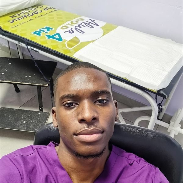 Mr Simwanza Geoffrey, Receptionist at Excellia Private Hospital
